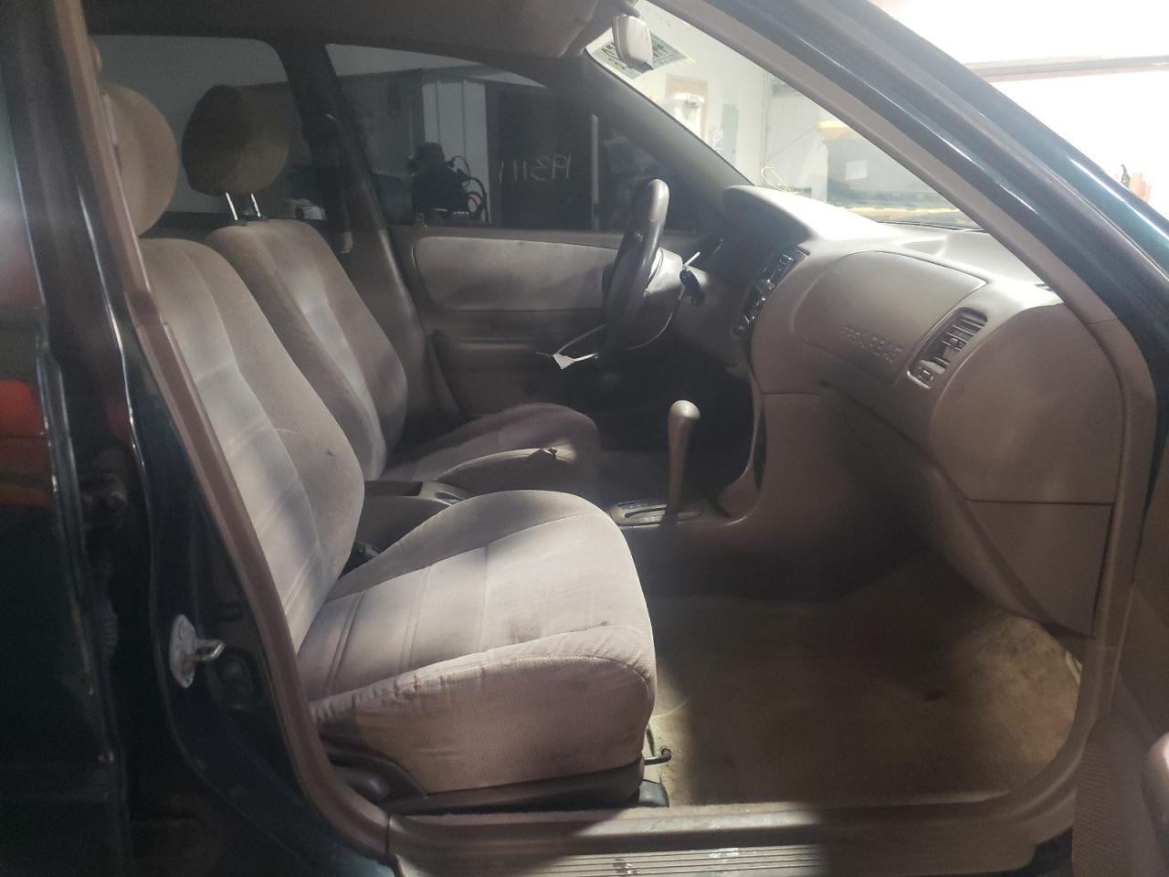 Photo 5 from auction – 1997 TOYOTA COROLLA DX with VIN 2T1BB02E4VC200727