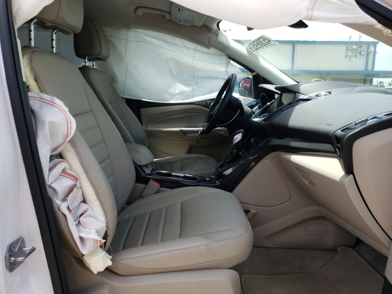 Photo 5 from auction – 2015 FORD ESCAPE TIT with VIN 1FMCU0J96FUC01560