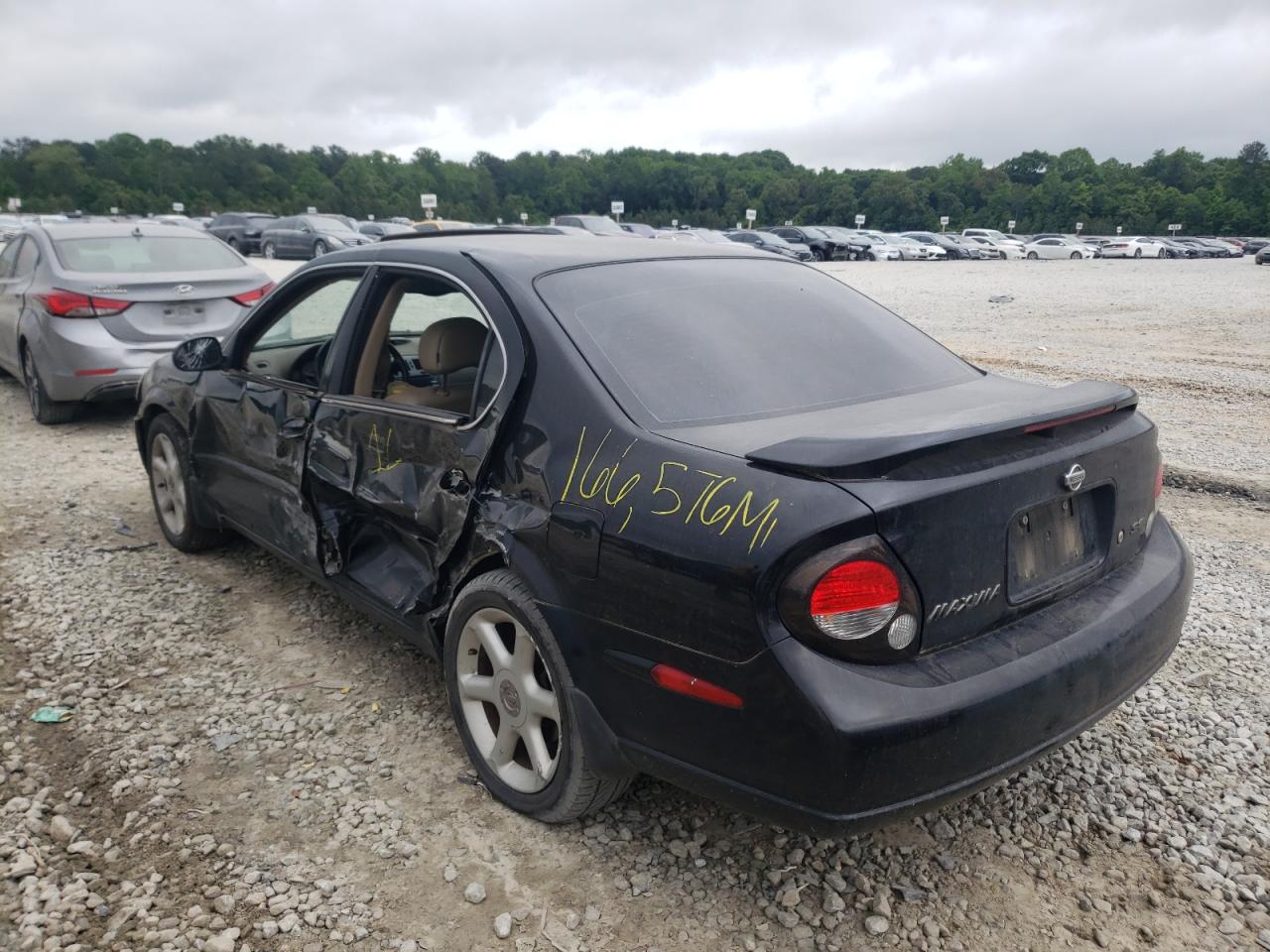 Photo 3 from auction – 2001 NISSAN MAXIMA GXE with VIN JN1CA31AX1T311375