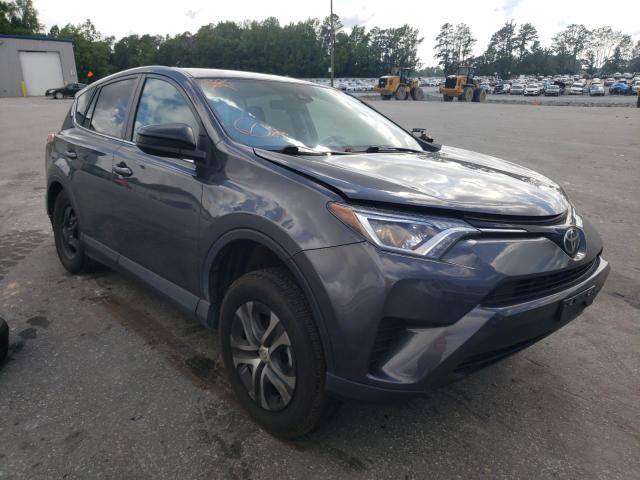 TOYOTA RAV4 LE 2018 with VIN 2T3ZFREV7JW505660 - Photo from auction