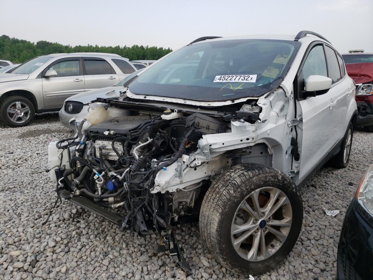 Photo 2 from auction – 2018 FORD ESCAPE SE with VIN 1FMCU9GD9JUB84830