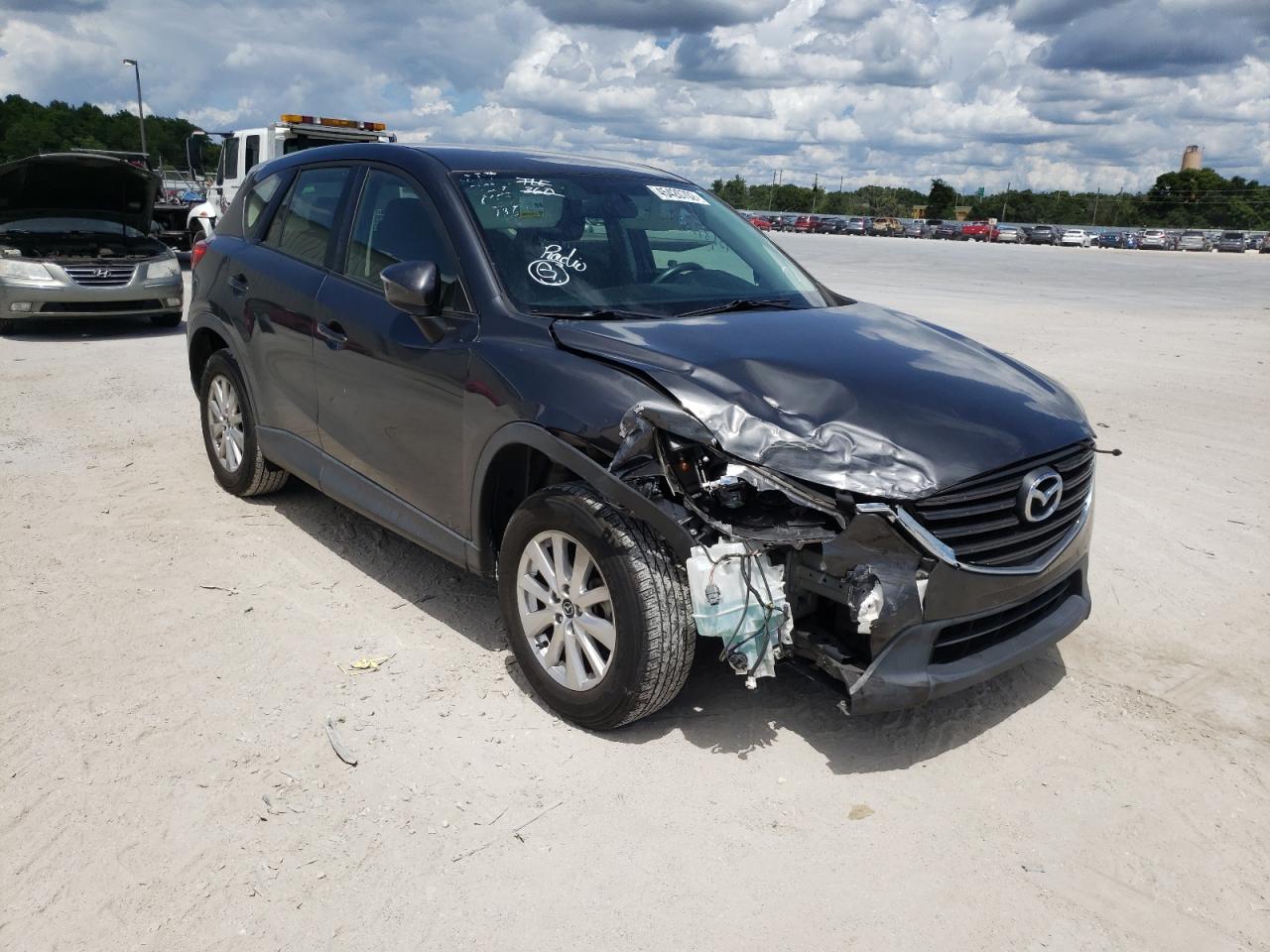 MAZDA CX-5 SPORT 2016 with VIN JM3KE2BY3G0773300 - Photo from auction