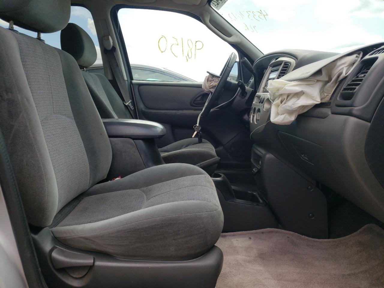 Photo 5 from auction – 2004 MAZDA TRIBUTE LX with VIN 4F2YZ04194KM10270