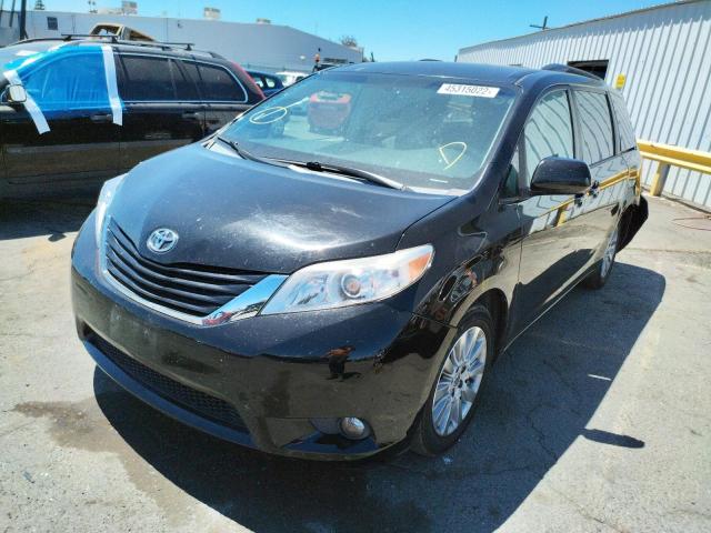 Photo 2 from auction – 2014 TOYOTA SIENNA LE with VIN 5TDJK3DC5ES090836