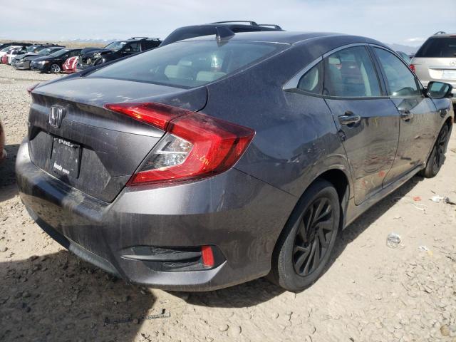 Photo 4 from auction – 2018 HONDA CIVIC EX with VIN 19XFC2F79JE041012