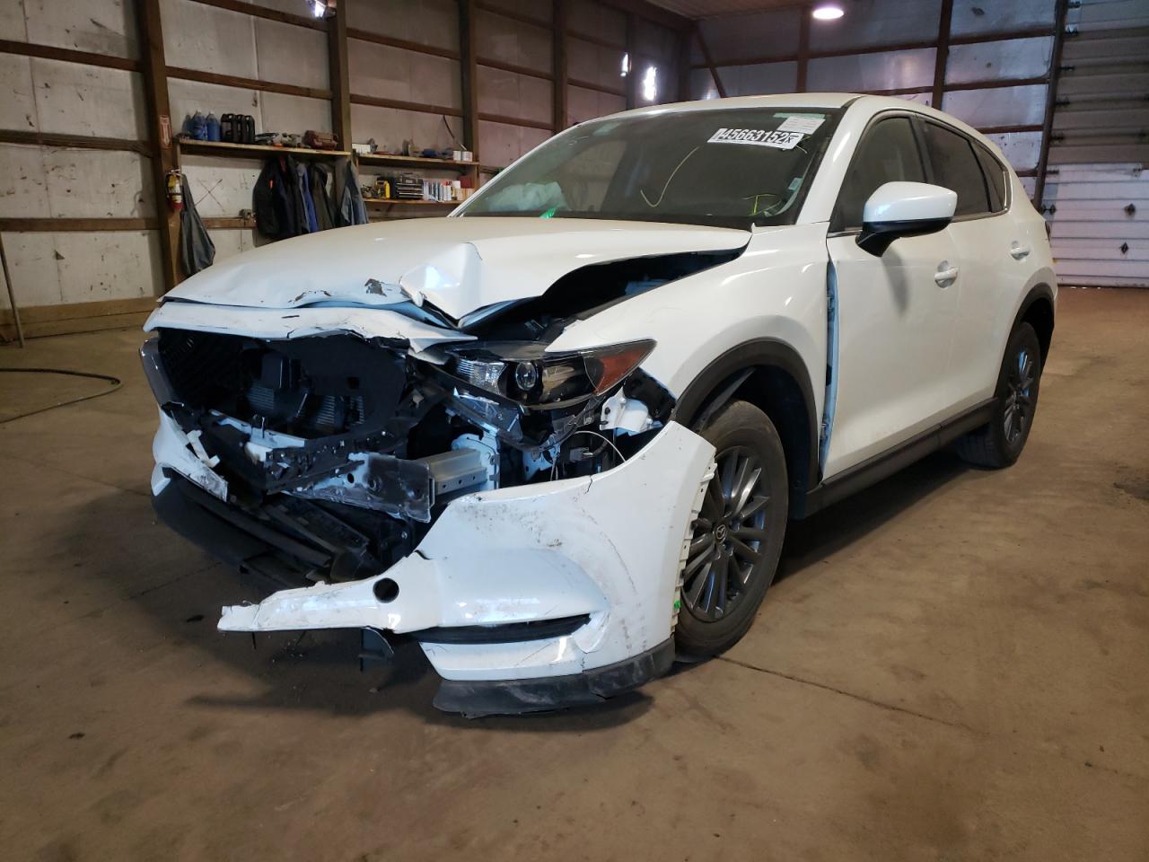 Photo 2 from auction – 2021 MAZDA CX-5 TOURI with VIN JM3KFACM7M0328573