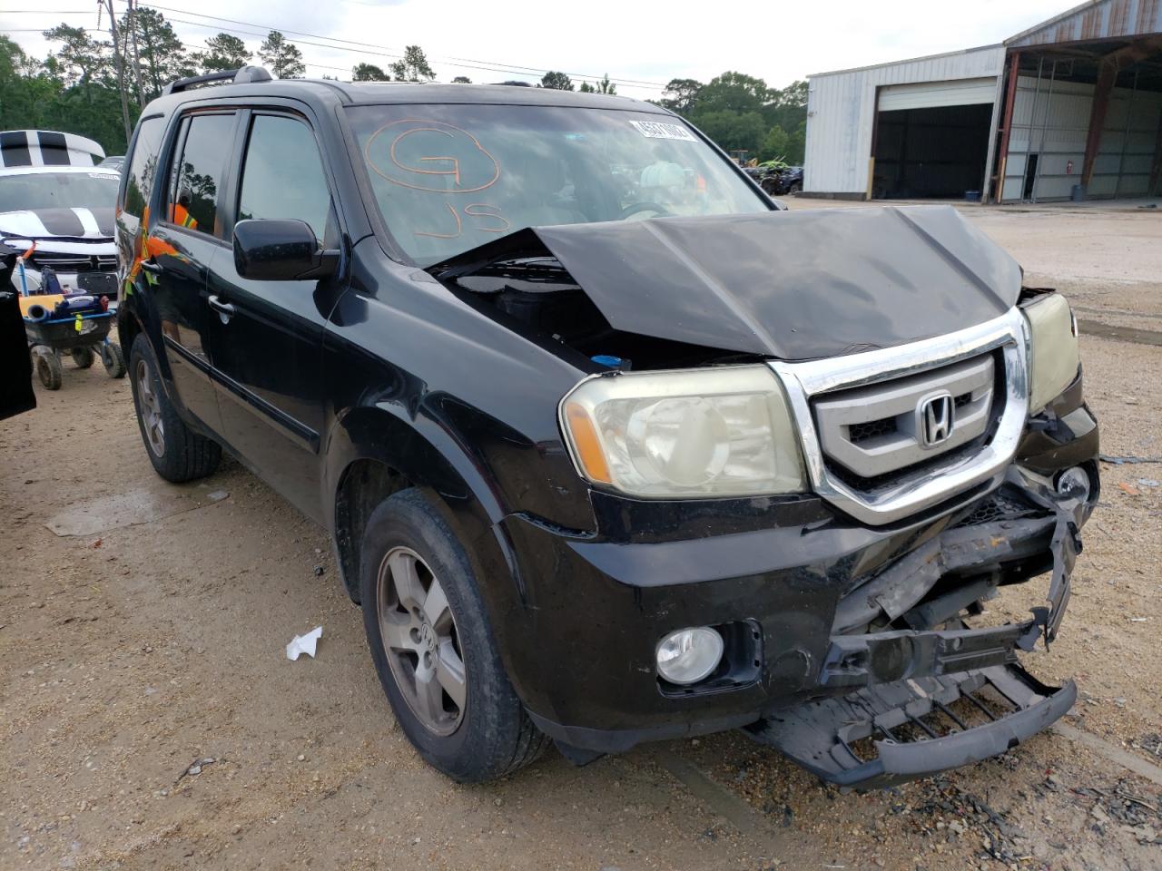 HONDA PILOT EXL 2011 with VIN 5FNYF3H56BB002097 - Photo from auction