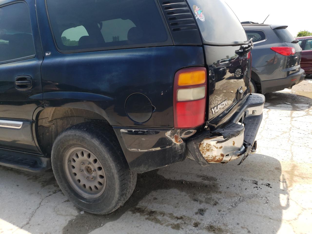 Photo 9 from auction – 2001 GMC YUKON with VIN 1GKEC13T91R216682