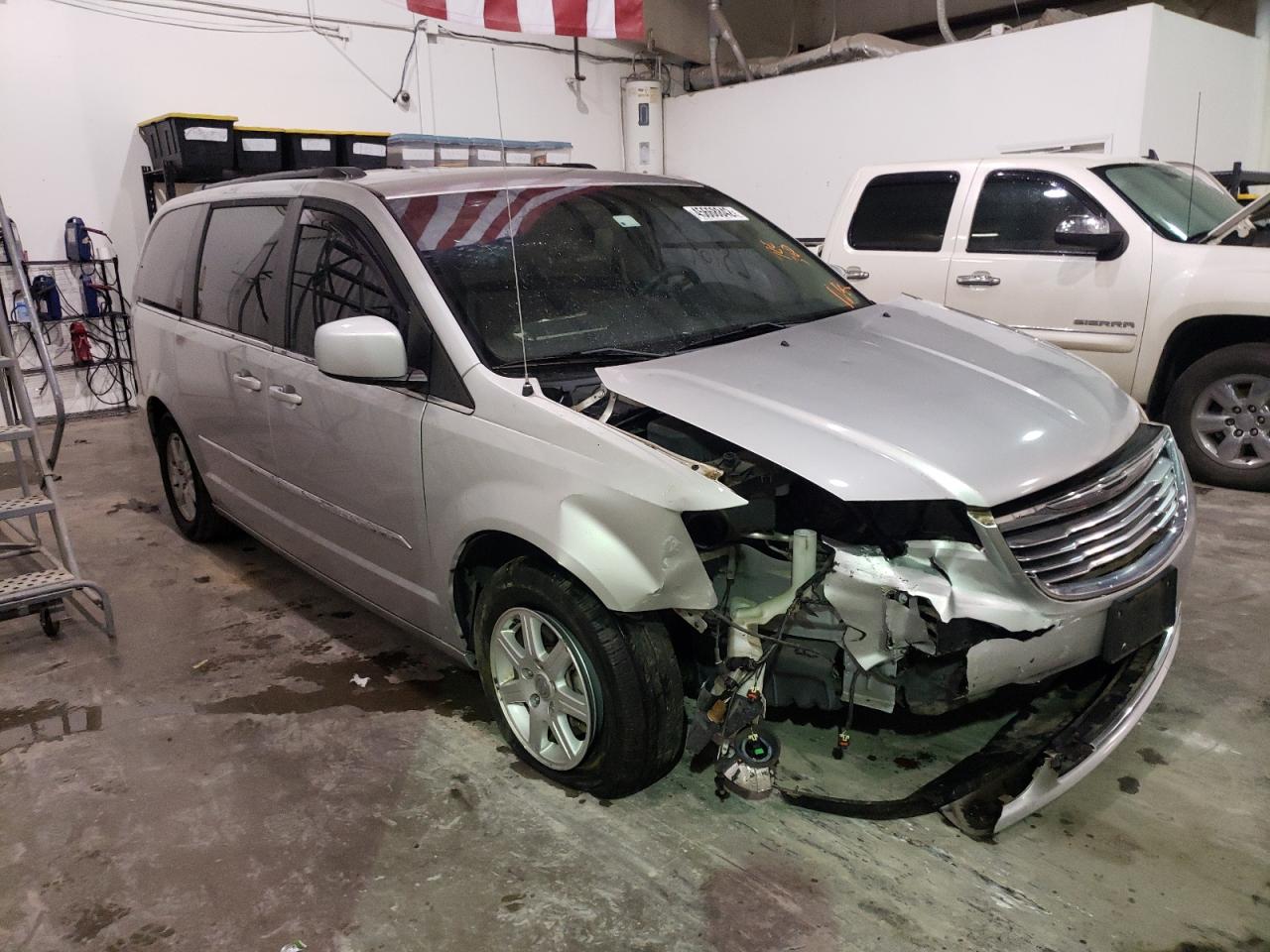 CHRYSLER TOWN & COU 2011 with VIN 2A4RR5DG8BR607882 - Photo from auction