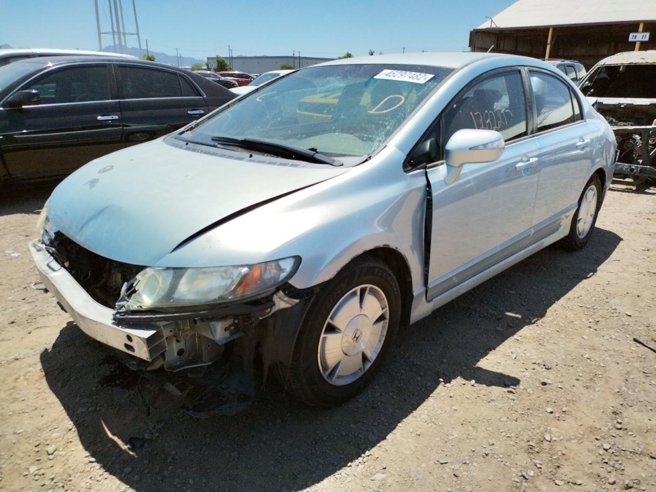 Photo 2 from auction – 2006 HONDA CIVIC with VIN JHMFA36206S013330