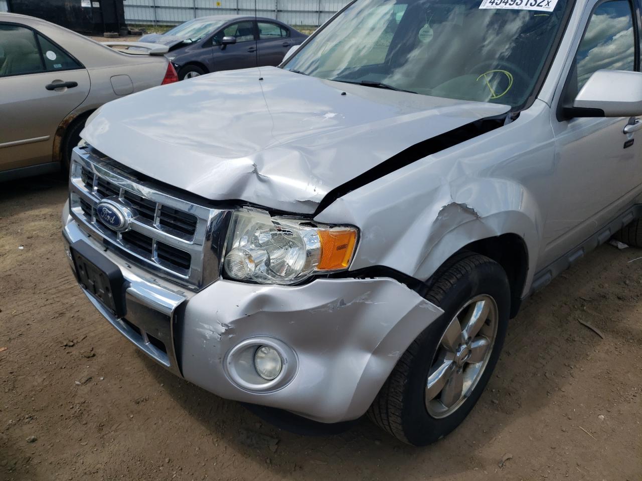 Photo 9 from auction – 2009 FORD ESCAPE LIM with VIN 1FMCU04G89KA25654