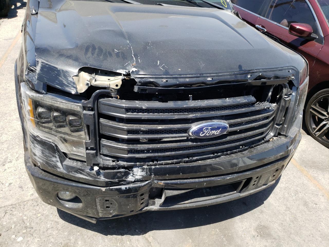 Photo 9 from auction – 2014 FORD F150 with VIN 1FTMF1CT9EFB31699