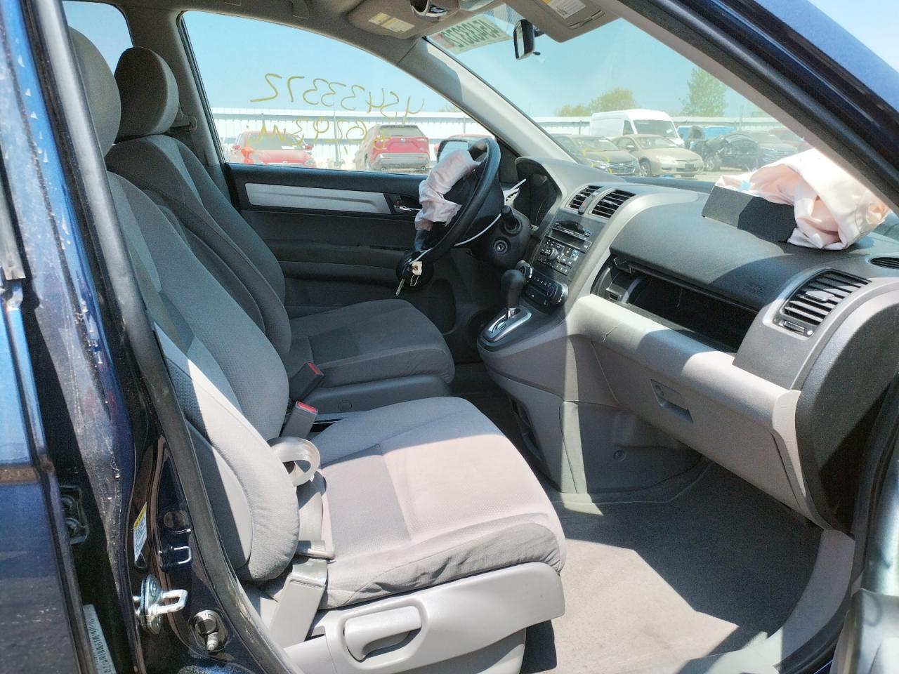 Photo 5 from auction – 2011 HONDA CR-V SE with VIN 5J6RE4H44BL098078