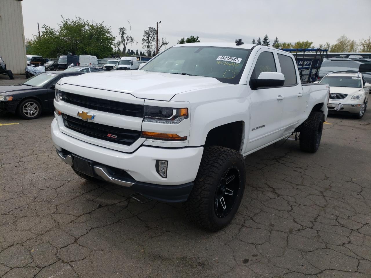 Photo 2 from auction – 2018 CHEVROLET SILVERADO with VIN 3GCUKREC2JG414106