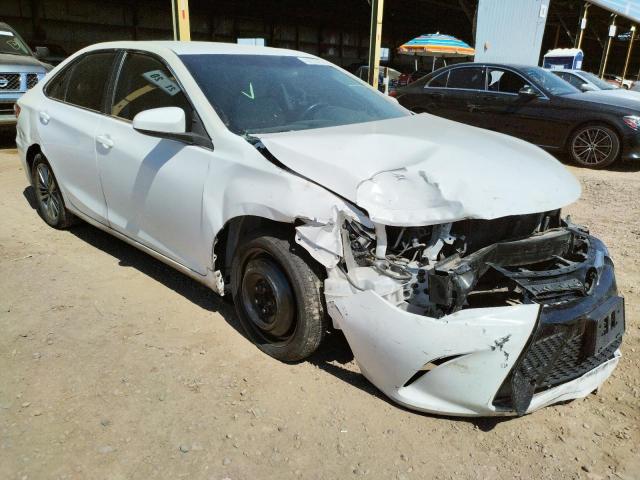 TOYOTA CAMRY LE 2017 with VIN 4T1BF1FK0HU658892 - Photo from auction
