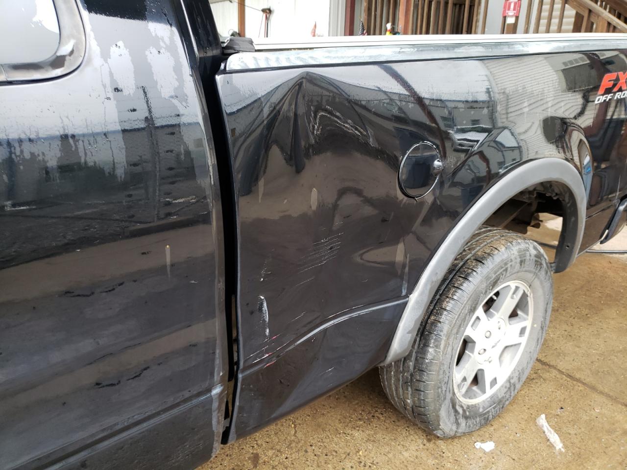 Photo 9 from auction – 2004 FORD F150 with VIN 1FTPX14504NB46963