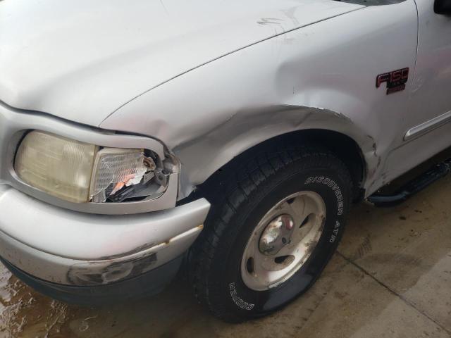 Photo 9 from auction – 2000 FORD F150 with VIN 1FTRX17W6YNC08823