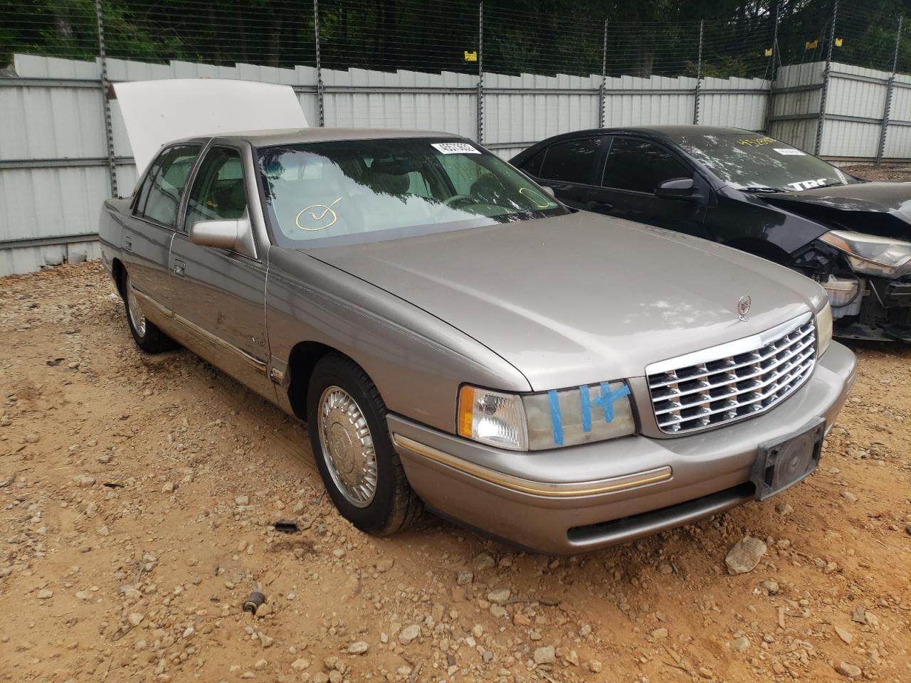 CADILLAC DEVILLE DE 1999 with VIN 1G6KE54YXXU712559 - Photo from auction