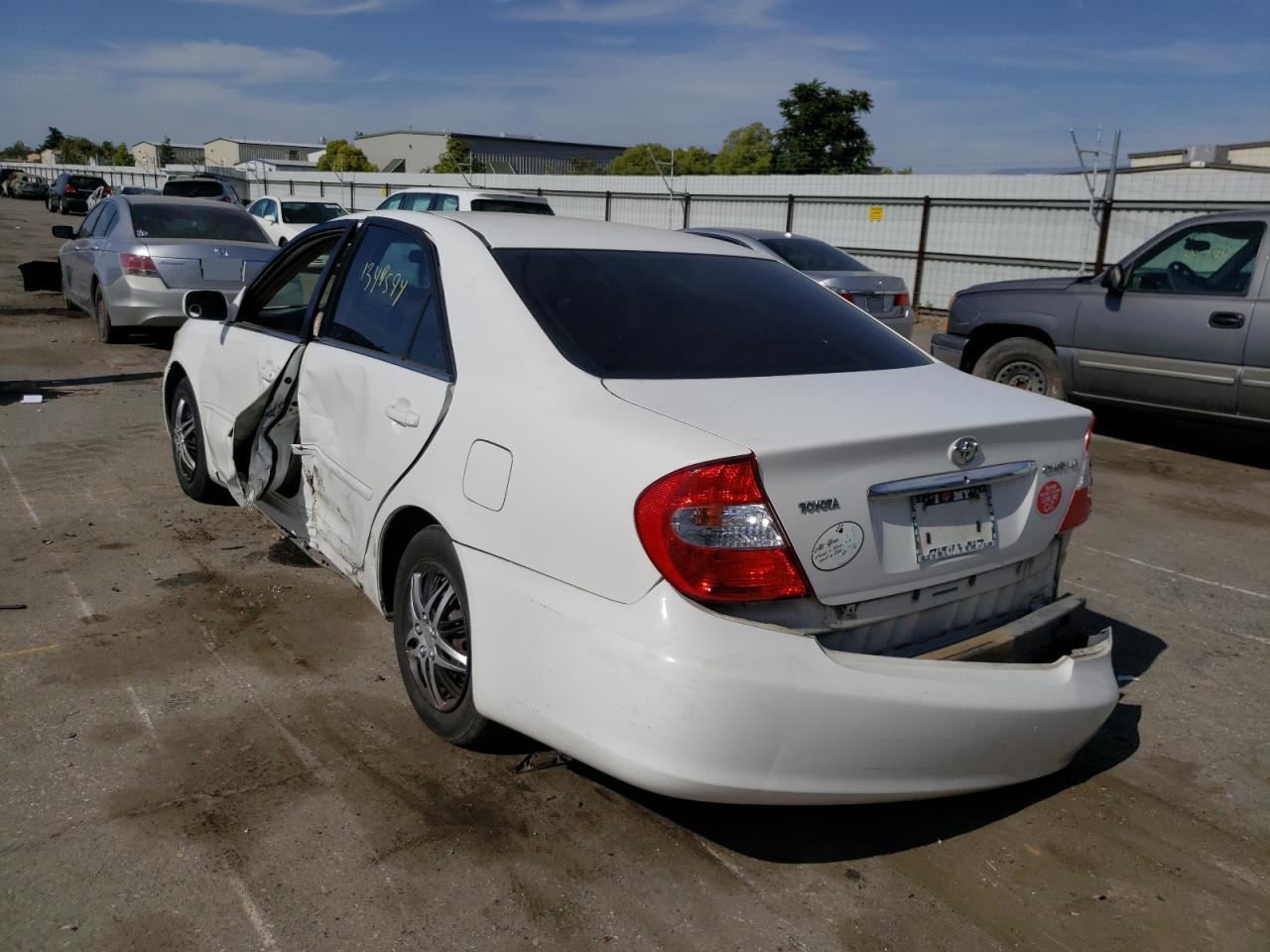 Photo 19 from auction – 2002 TOYOTA CAMRY LE with VIN 4T1BE32K12U008982
