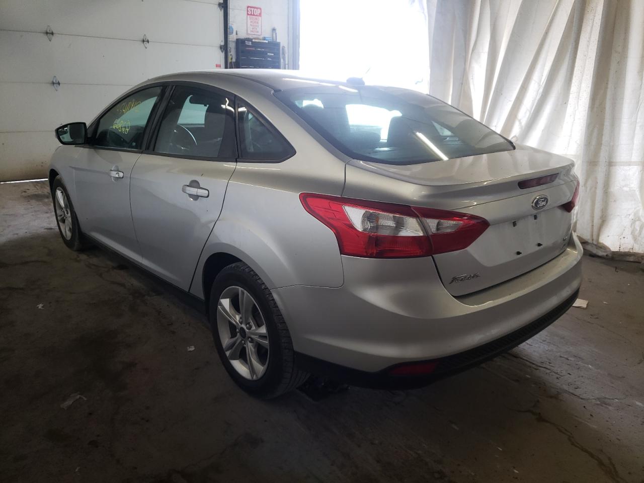 Photo 3 from auction – 2013 FORD FOCUS SE with VIN 1FADP3F25DL348801
