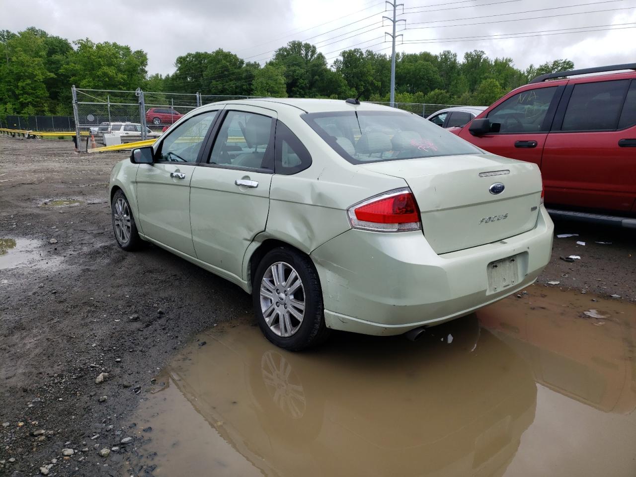 Photo 9 from auction – 2011 FORD FOCUS SEL with VIN 1FAHP3HN7BW143095