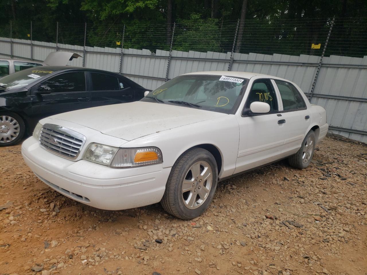 Photo 2 from auction – 2011 FORD CROWN VICT with VIN 2FABP7EV1BX147553