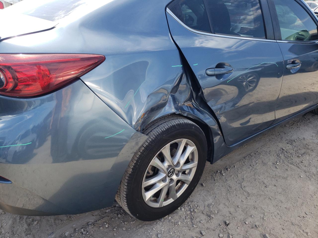Photo 9 from auction – 2014 MAZDA 3 TOURING with VIN JM1BM1V73E1146984