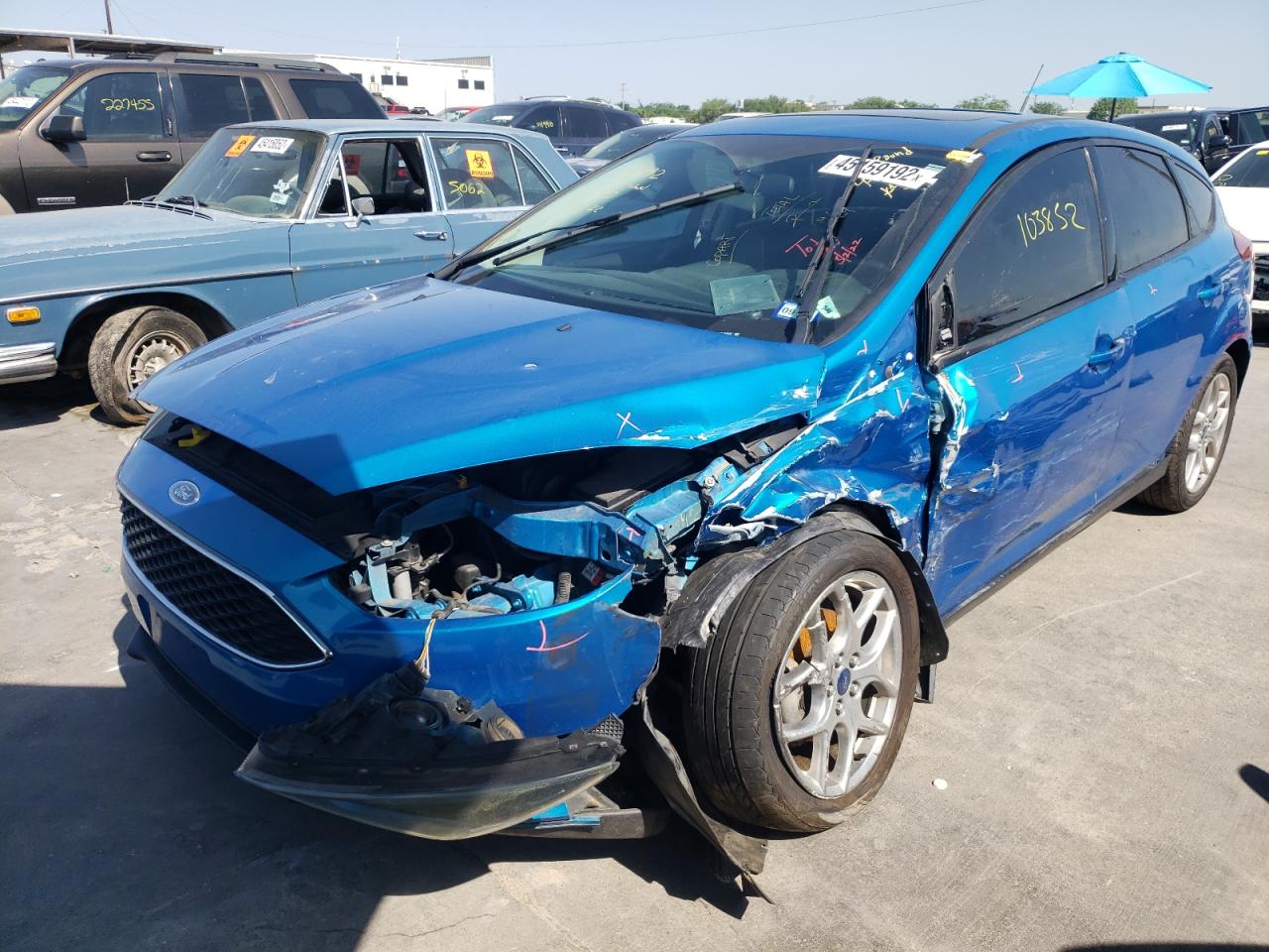 Photo 2 from auction – 2015 FORD FOCUS SE with VIN 1FADP3K26FL326847