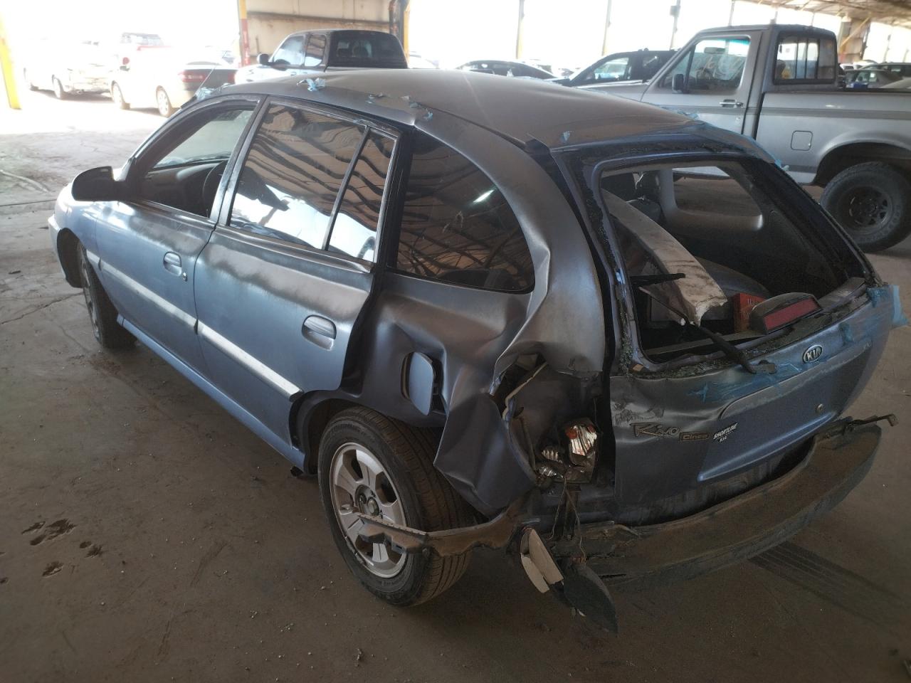Photo 3 from auction – 2004 KIA RIO CINCO with VIN KNADC165346184660