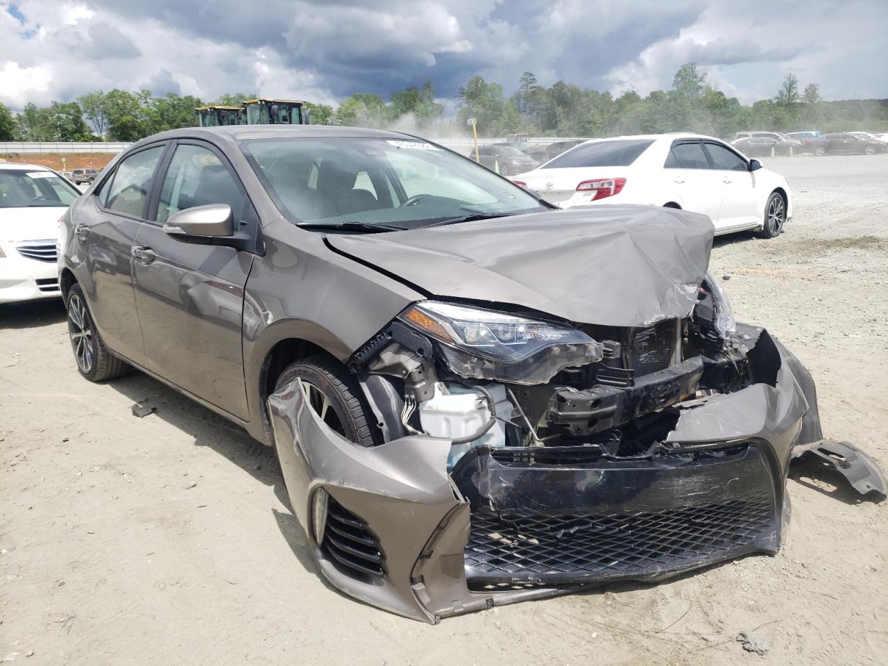 TOYOTA COROLLA L 2017 with VIN 5YFBURHE5HP734149 - Photo from auction
