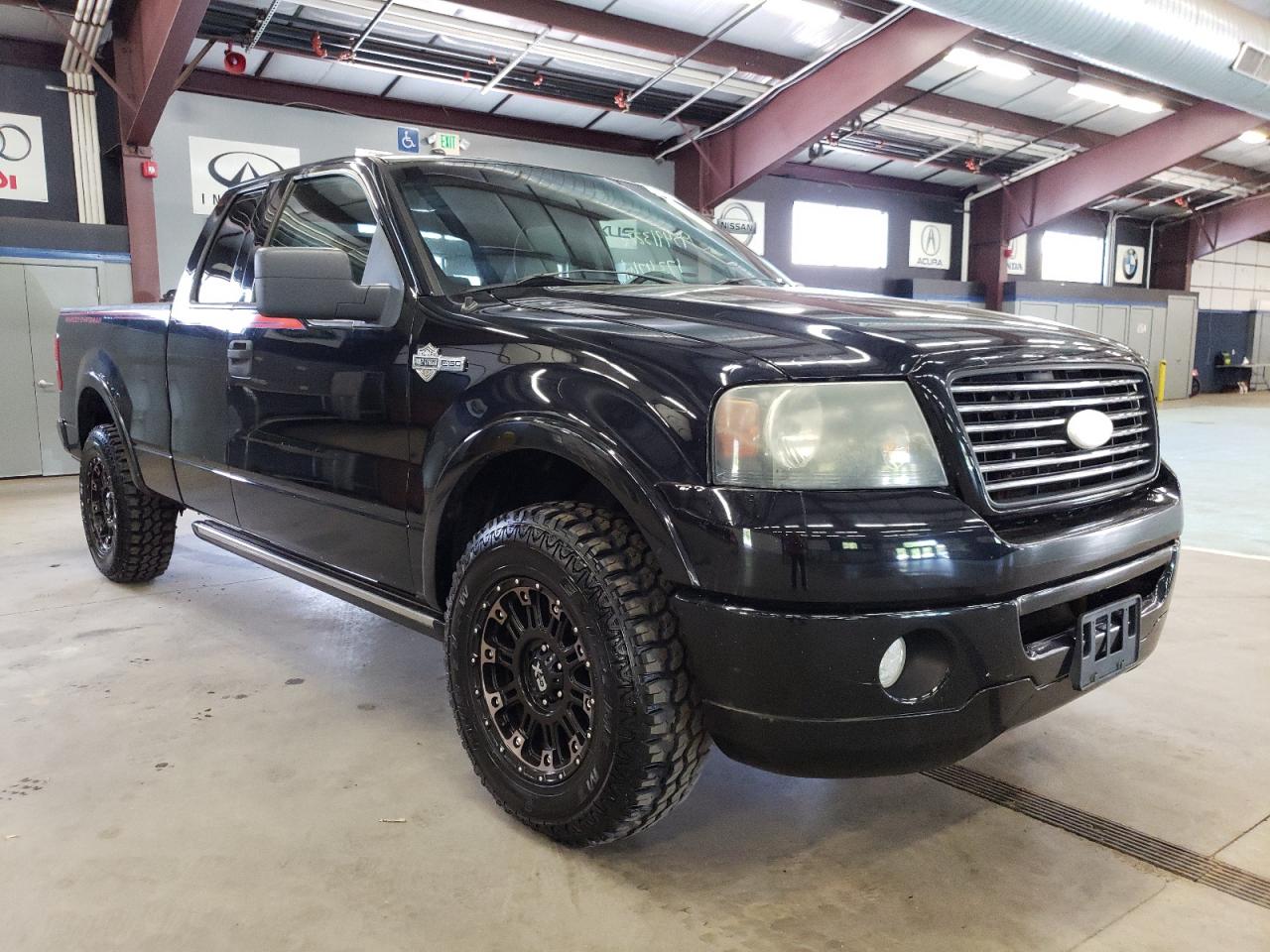 Фото 13 с аукциона – 2006 FORD F150 с VIN 1FTRX14566FA77198