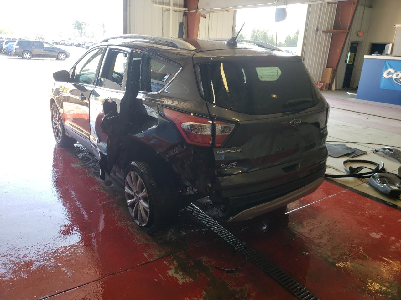 Photo 3 from auction – 2018 FORD ESCAPE TIT with VIN 1FMCU9J94JUB93648