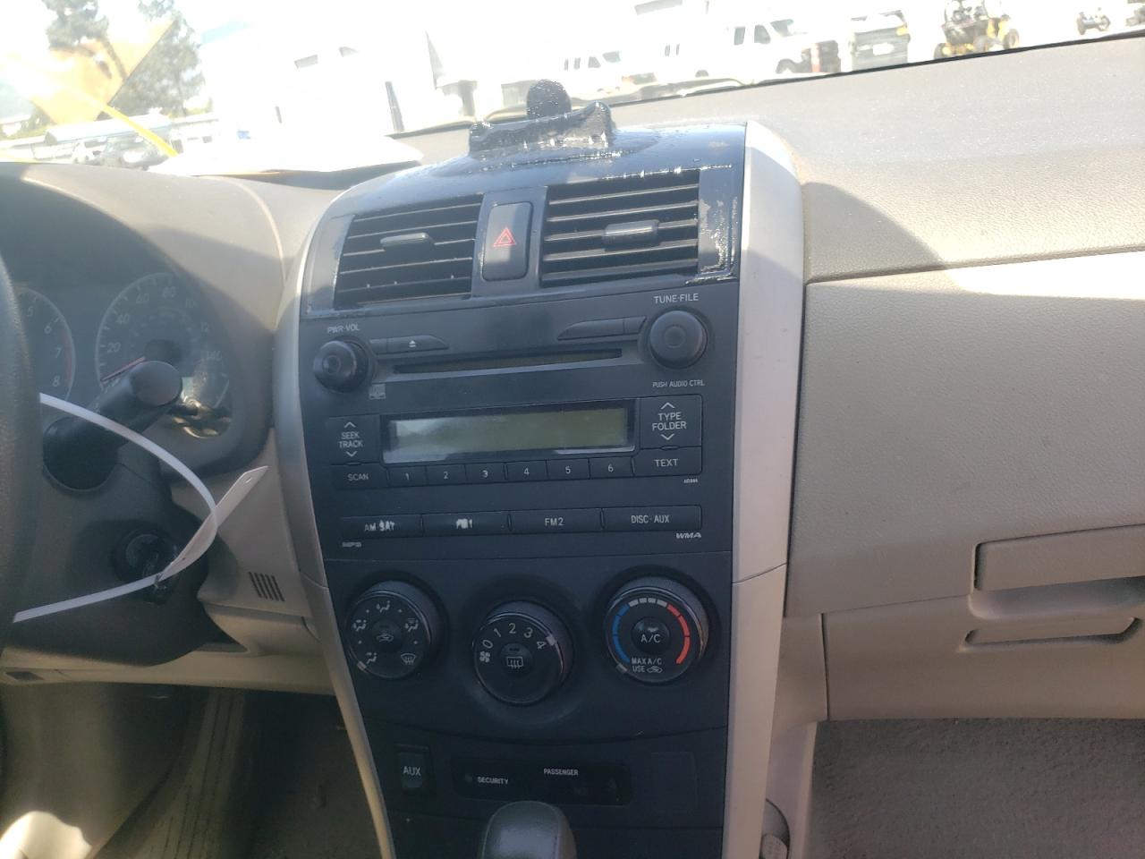 Photo 9 from auction – 2009 TOYOTA COROLLA with VIN 1NXBU40E79Z129578