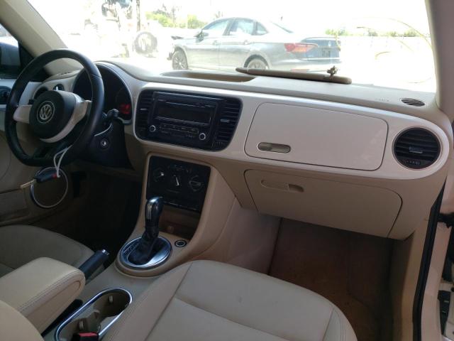 Photo 9 from auction – 2013 VOLKSWAGEN BEETLE with VIN 3VWJX7AT3DM679750