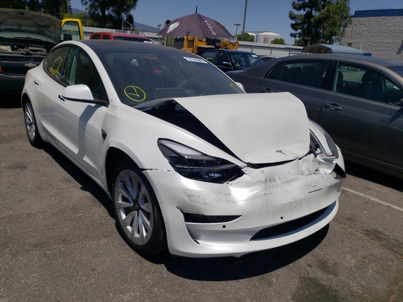 TESLA MODEL 3 2022 with VIN 5YJ3E1EA3NF144110 - Photo from auction