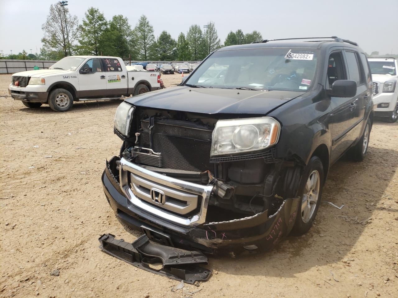 Photo 2 from auction – 2011 HONDA PILOT EX with VIN 5FNYF4H49BB100134