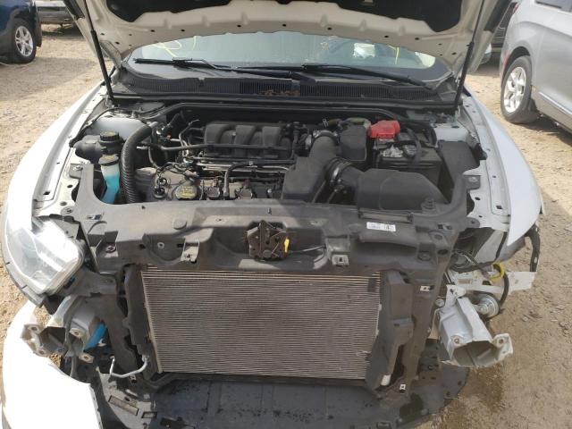 Photo 7 from auction – 2014 FORD TAURUS SEL with VIN 1FAHP2E85EG119272