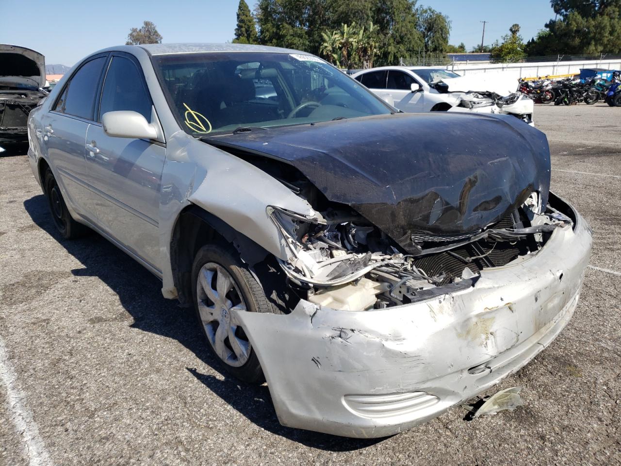 TOYOTA CAMRY LE 2003 with VIN 4T1BE32K83U698876 - Photo from auction