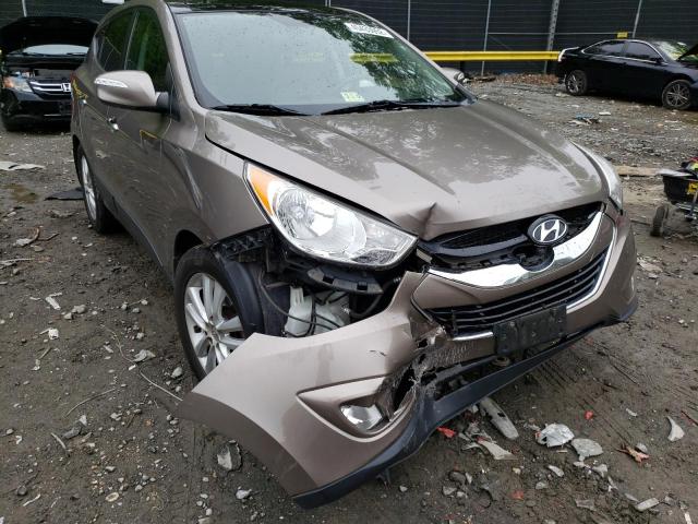 Photo 9 from auction – 2011 HYUNDAI TUCSON GLS with VIN KM8JUCAC0BU242491