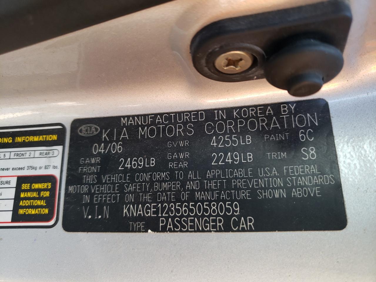 Photo 10 from auction – 2006 KIA OPTIMA LX with VIN KNAGE123565058059