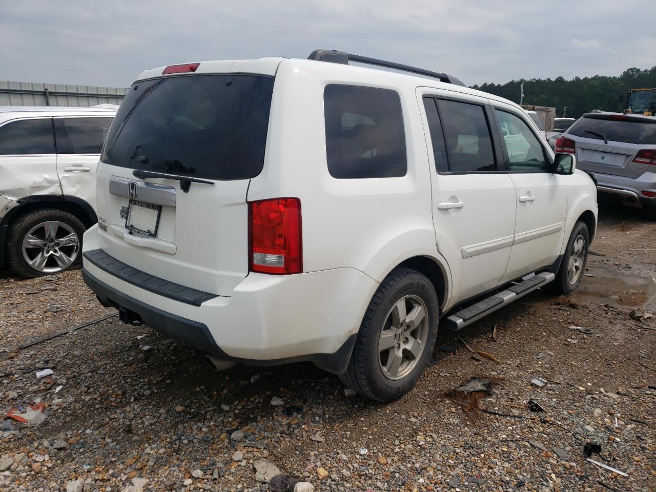 Photo 4 from auction – 2011 HONDA PILOT EXL with VIN 5FNYF3H65BB057567