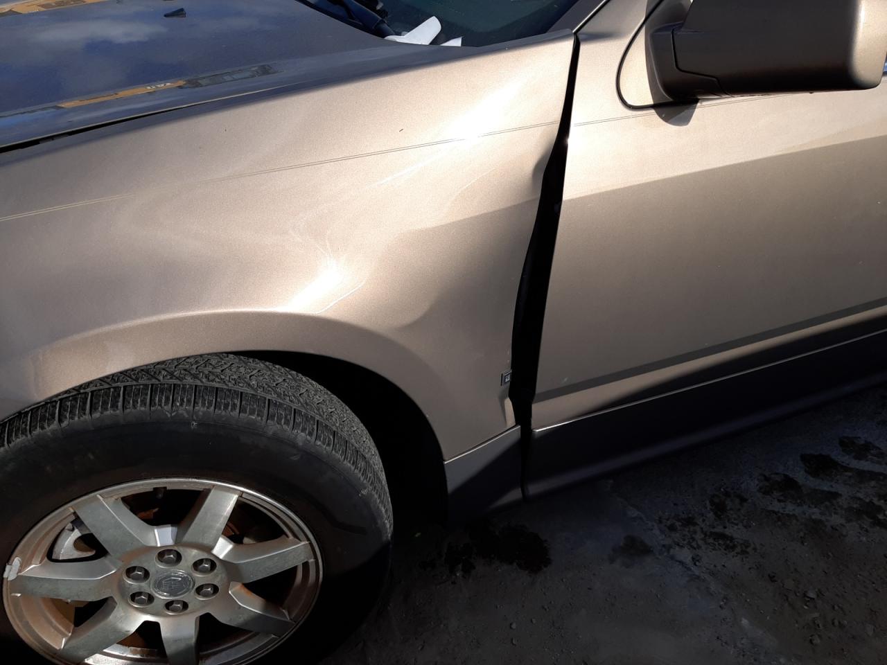 Photo 10 from auction – 2006 CADILLAC SRX with VIN 1GYEE637860217771