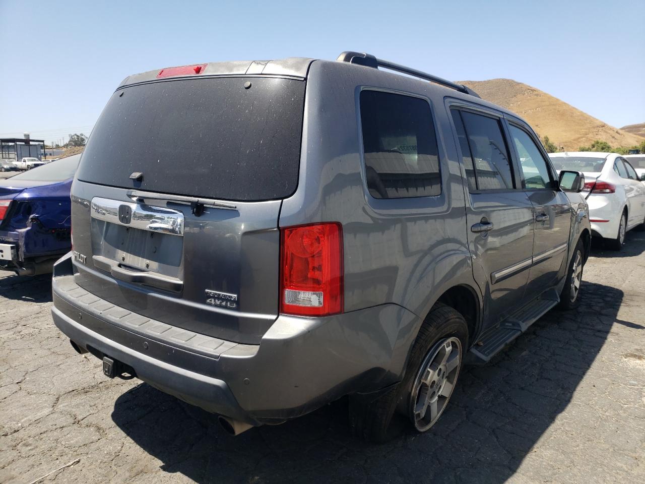 Photo 4 from auction – 2010 HONDA PILOT TOUR with VIN 5FNYF4H88AB015867