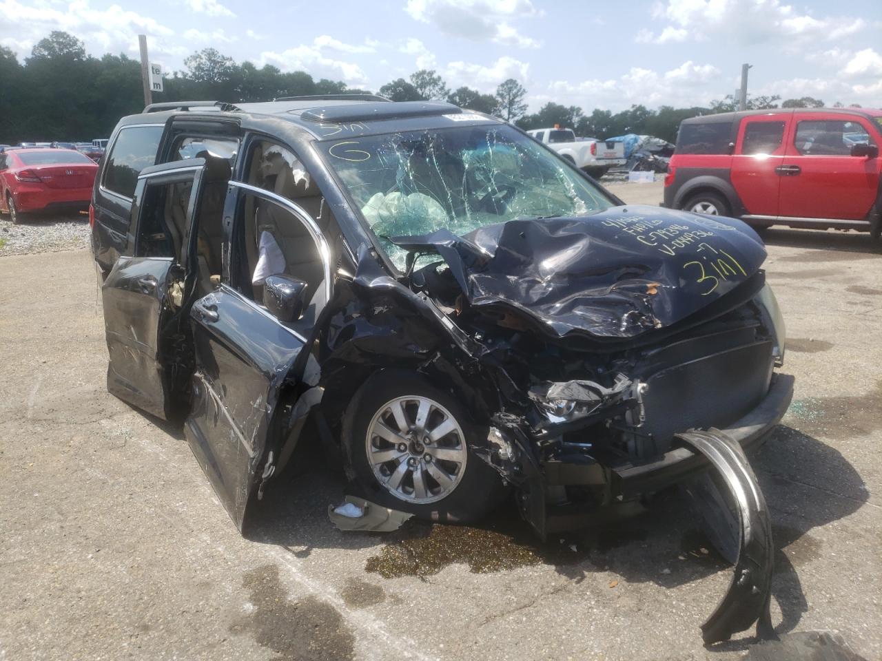 HONDA ODYSSEY EX 2009 with VIN 5FNRL38709B044936 - Photo from auction