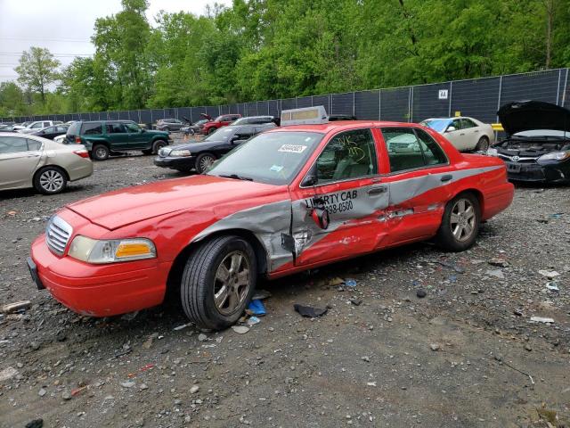 Photo 9 from auction – 2011 FORD CROWN VICT with VIN 2FABP7EV3BX144119