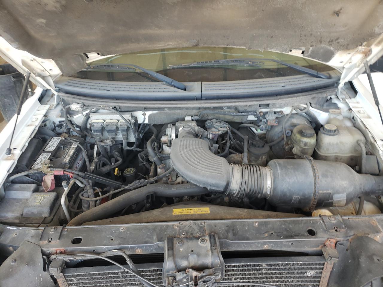 Photo 7 from auction – 2004 FORD F150 with VIN 1FTRX14W64NA93560