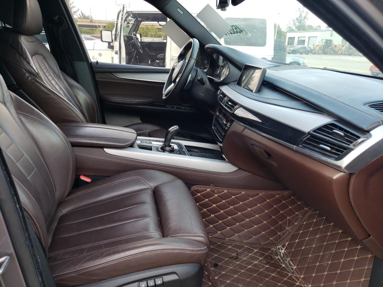 Photo 5 from auction – 2014 BMW X5 XDRIVE5 with VIN 5UXKR6C55E0C02107