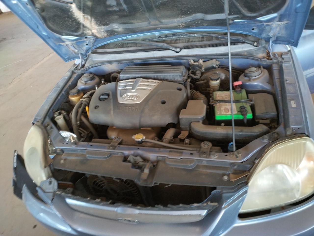 Photo 7 from auction – 2004 KIA RIO CINCO with VIN KNADC165346184660