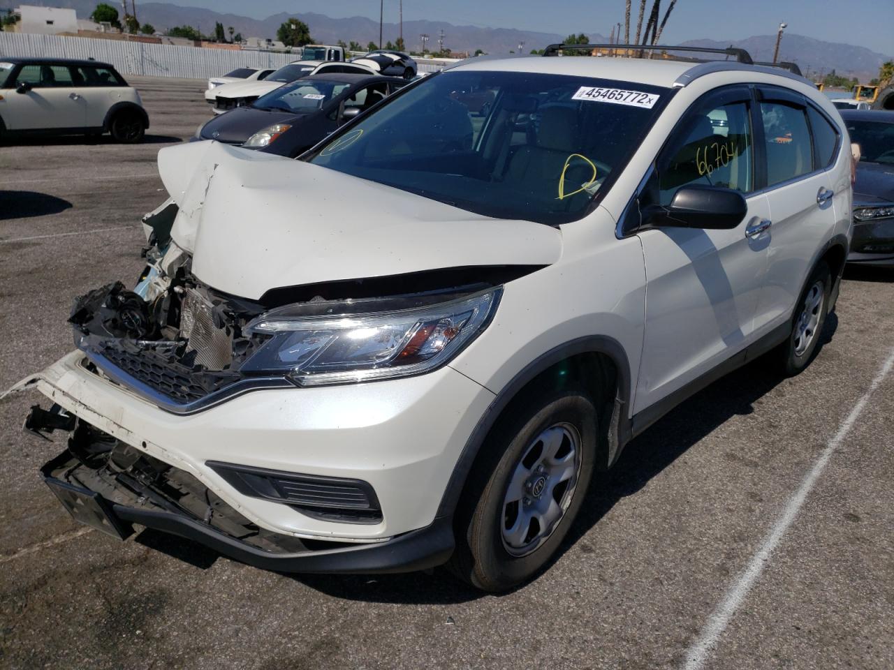 Photo 2 from auction – 2016 HONDA CR-V LX with VIN 5J6RM3H34GL009055