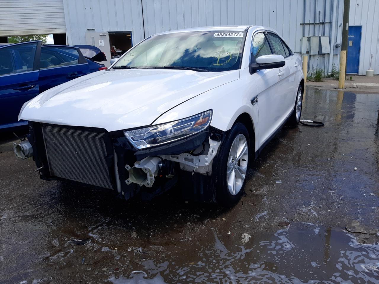 Photo 2 from auction – 2016 FORD TAURUS SEL with VIN 1FAHP2E8XGG118458